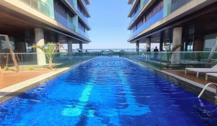 Apartamento Flat de Luxo, planejado, vista lateral Lagoa e Mar, sol matinal, no Grand Hyatt na Praia da Barra da Tijuca