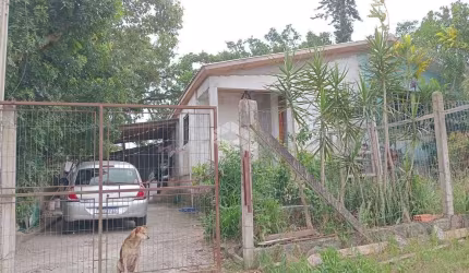 CASA TÉRREA DE 2 QUARTOS  EM TERRENO DE ESQUINA