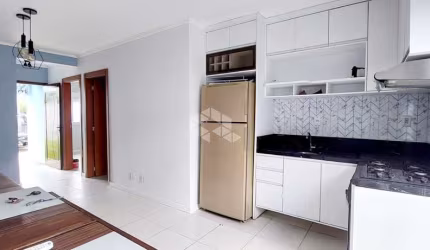 CASA TÉRREA DE 2 QUARTOS, VAGA DE GARAGEM E PÁTIO