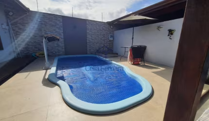 Casa à venda na Martim de Sá com piscina, área gourmet e ótima localização.