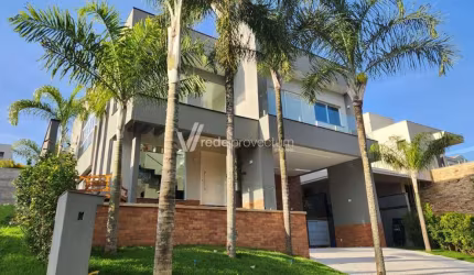Casa em condomínio fechado com 4 quartos para alugar na Rua das Abélias, 1, Alphaville Dom Pedro, Campinas, 354 m2 por R$ 23.000