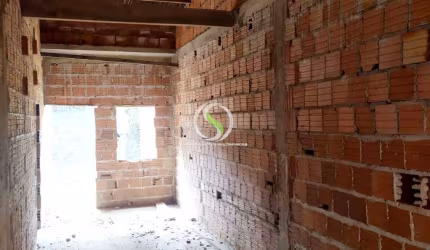 vendo uma casa em construção.