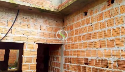vendo uma casa em construção.