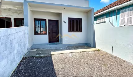 CASA DE DOIS DORMITÓRIOS COM SUÍTE