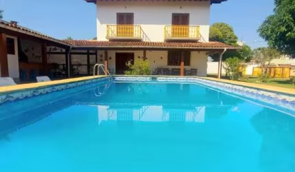 Casa com 5 dormitórios à venda, 412 m² por R$ 1.950.000,00 - Extensão do Bosque - Rio das Ostras/RJ