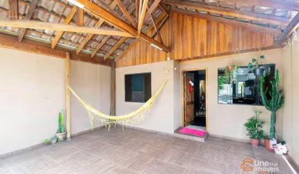 CASA COM ESPAÇO DE TERRENO