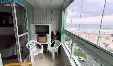 APARTAMENTO MOBILIADO EM PREDIO FRENTE PRAIA, COM VISTA MAR, 2 QUARTOS 1 SUÍTE, SACADA COM CHURRASQUEIRA, PISCINA,