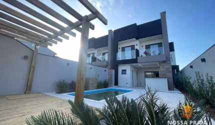 Sobrado com 3 dormitórios à venda, 164 m² por R$ 1.070.000,00 - Jardim Perola do Atlântico - Itapoá/SC