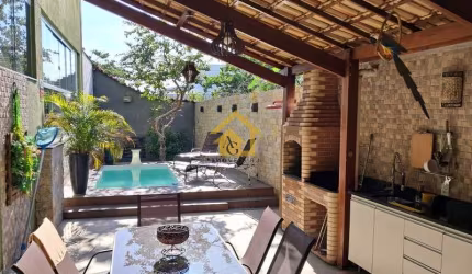 Casa dos Sonhos no Jardim Carioca! Viva em um paraíso urbano, com 3 quartos, piscina e placas solares. Venha conferir!