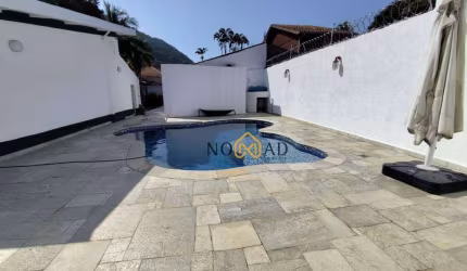 Casa com 5 dormitórios à venda, 240 m² por R$ 2.300.000,00 - Praia do Guaiúba - Guarujá/SP