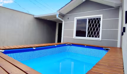 Casa à venda em Fazenda Rio Grande - Semi-novo com churrasqueira e varanda