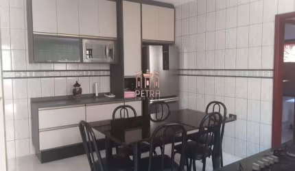 Casa com 3 dormitórios à venda, 100 m²