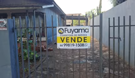 Terreno com casa.