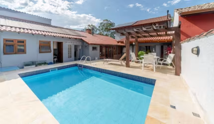 Casa em condomínio fechado com 3 quartos à venda na Avenida Juca Batista, 1200, Cavalhada, Porto Alegre por R$ 1.600.000