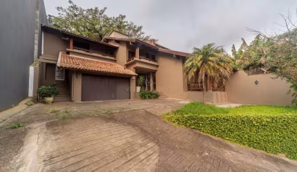Casa com 3 quartos à venda na Rua Edgar Luiz Schneider, 510, Jardim Isabel, Porto Alegre por R$ 1.450.000