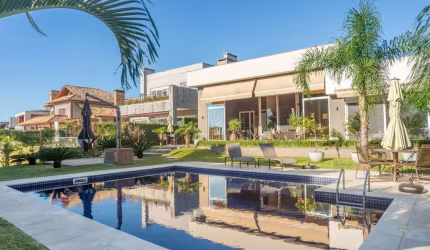 Casa em condomínio fechado com 3 quartos à venda na Avenida Juca Batista, 8000, Belém Novo, Porto Alegre por R$ 3.790.000