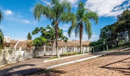 Casa em condomínio fechado com 3 quartos à venda na Avenida Coronel Marcos, 39, Pedra Redonda, Porto Alegre por R$ 980.000