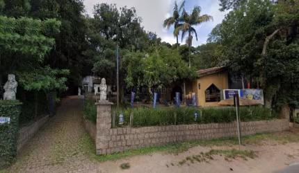 Casa com 4 quartos à venda na Avenida Coronel Marcos, 880, Pedra Redonda, Porto Alegre por R$ 2.400.000