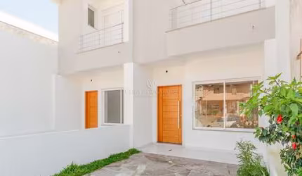 Casa com 2 quartos à venda na Rua Itacyr Rossi, 191, Guarujá, Porto Alegre por R$ 500.000