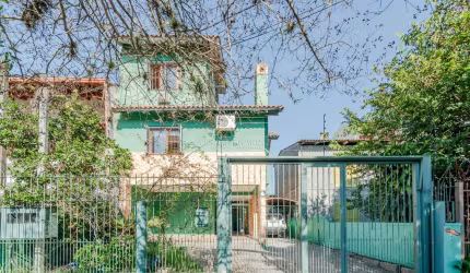 Casa com 3 quartos à venda na Rua Afonso Arinos, 467, Camaquã, Porto Alegre por R$ 890.000