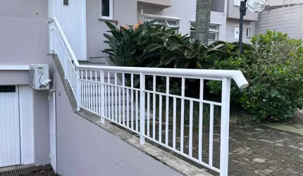 Casa em condomínio fechado com 3 quartos à venda na Avenida Coronel Marcos, 483, Pedra Redonda, Porto Alegre por R$ 1.100.000