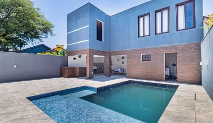Casa com 4 quartos à venda na Rua Jacundá, 132, Guarujá, Porto Alegre por R$ 1.500.000
