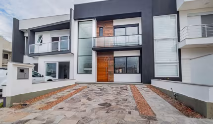 Casa em condomínio fechado com 3 quartos à venda na Rua Jorge Babot Miranda, 680, Hípica, Porto Alegre por R$ 930.000