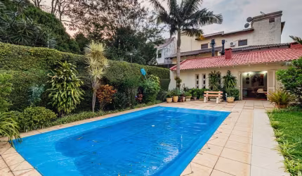 Casa com 3 quartos à venda na Avenida Cinco de Novembro, 300, Teresópolis, Porto Alegre por R$ 950.000
