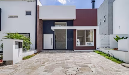 Casa em condomínio fechado com 3 quartos à venda na Rua Jorge Babot Miranda, 680, Hípica, Porto Alegre por R$ 680.000