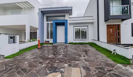 Casa em condomínio fechado com 3 quartos à venda na Rua Jorge Babot Miranda, 680, Hípica, Porto Alegre por R$ 610.000