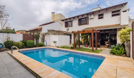 Casa com 4 quartos à venda na Rua Engenheiro Coelho Parreira, 384, Ipanema, Porto Alegre por R$ 1.272.000