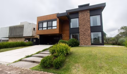 Casa em condomínio fechado com 5 quartos à venda na Avenida Juca Batista, 8000, Belém Novo, Porto Alegre por R$ 3.800.000