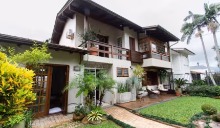 Casa com 3 quartos à venda na Rua Olécio Cavedini, 235, Espírito Santo, Porto Alegre por R$ 790.000