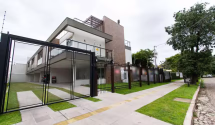 Casa em condomínio fechado com 3 quartos à venda na Avenida Pereira Passos, 695, Vila Assunção, Porto Alegre por R$ 1.700.000