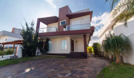 Casa em condomínio fechado com 3 quartos à venda na Avenida Edgar Pires de Castro, 540, Aberta dos Morros, Porto Alegre por R$ 990.000