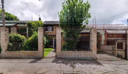 Casa com 3 quartos à venda na Rua Victor Silva, 136, Camaquã, Porto Alegre por R$ 1.000.000