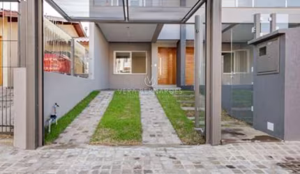 Casa com 3 quartos à venda na Rua Itacyr Rossi, 32, Guarujá, Porto Alegre por R$ 560.000