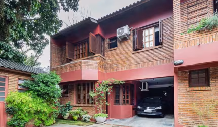 Casa em condomínio fechado com 3 quartos à venda na Avenida Coronel Marcos, 1608, Pedra Redonda, Porto Alegre por R$ 675.000