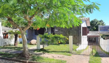 Casa com 3 quartos à venda na Rua Antônio Josephino Perrone, 343, Espírito Santo, Porto Alegre por R$ 490.000