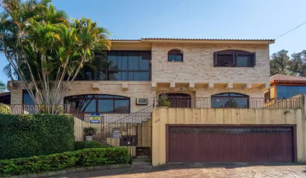 Casa com 3 quartos à venda na Rua dos Guenoas, 501, Guarujá, Porto Alegre por R$ 1.590.000