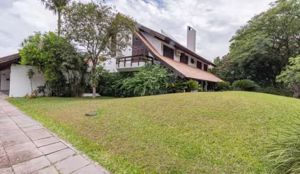 Casa em condomínio fechado com 6 quartos à venda na Avenida da Cavalhada, 5205, Cavalhada, Porto Alegre por R$ 4.000.000