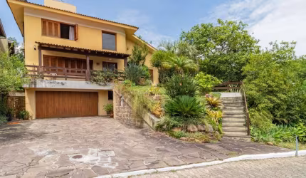 Casa em condomínio fechado com 3 quartos à venda na Rua Adriano Pereira da Silva, 311, Vila Nova, Porto Alegre por R$ 1.350.000