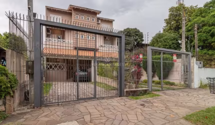 Casa com 3 quartos à venda na Rua dos Caiaguais, 91, Espírito Santo, Porto Alegre por R$ 1.100.000