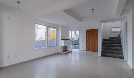 Casa em condomínio fechado com 3 quartos à venda na Rua Ivo Walter Kern, 599, Hípica, Porto Alegre por R$ 1.200.000