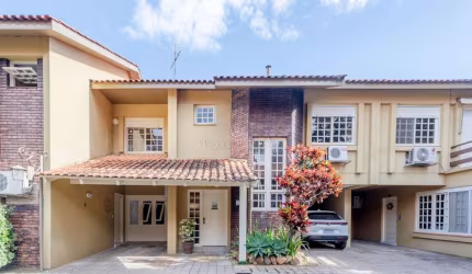 Casa em condomínio fechado com 3 quartos à venda na Rua Doutor Armando Barbedo, 832, Tristeza, Porto Alegre por R$ 795.000
