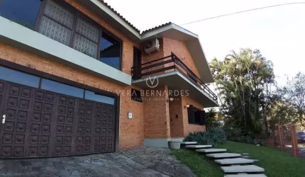 Casa com 4 quartos à venda na Rua Manauê, 60, Vila Assunção, Porto Alegre por R$ 1.190.000