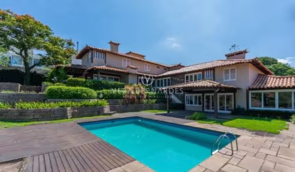 Casa em condomínio fechado com 5 quartos à venda na Avenida da Cavalhada, 5205, Cavalhada, Porto Alegre por R$ 4.800.000