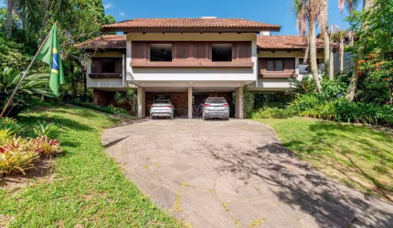 Casa em condomínio fechado com 5 quartos à venda na Avenida da Cavalhada, 5205, Cavalhada, Porto Alegre por R$ 3.890.000