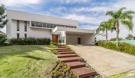 Casa em condomínio fechado com 4 quartos à venda na Avenida Juca Batista, 8000, Belém Novo, Porto Alegre por R$ 2.800.000