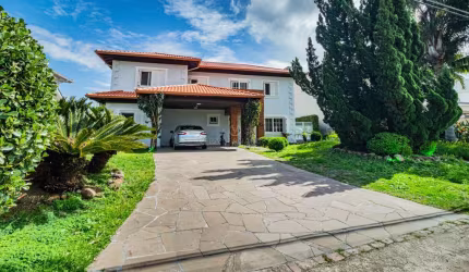 Casa em condomínio fechado com 3 quartos à venda na Avenida Juca Batista, 8000, Belém Novo, Porto Alegre por R$ 2.980.000